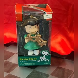 PEANUTS Holiday Clip-on Lucy With Gingerbread Forever Fun CVS